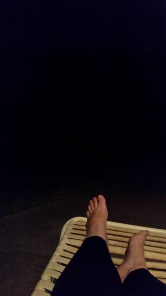 sitting on the back patio, at midnight.  it was still 80 degrees... 
